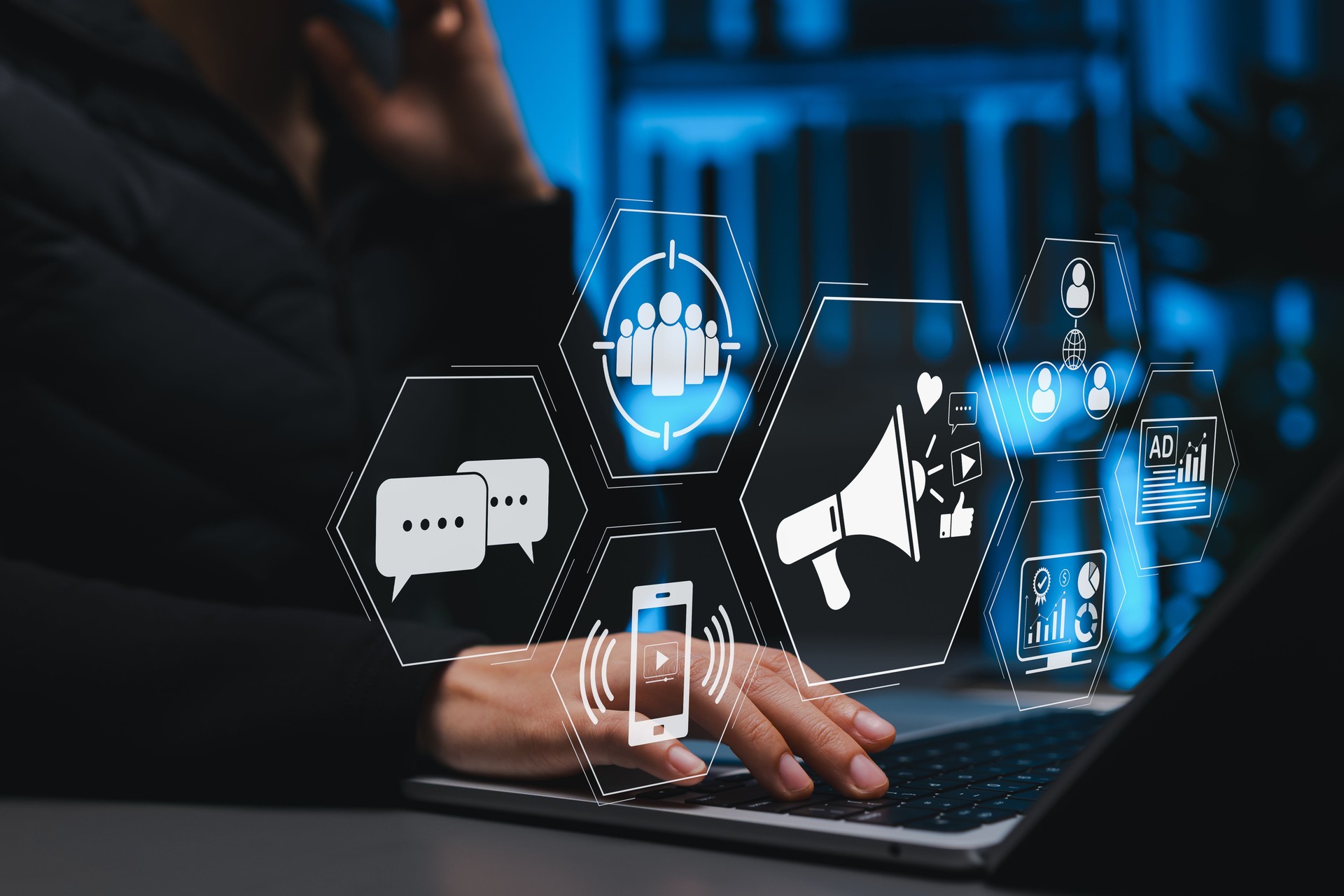 Digital Marketing Concept. Social Media Marketing, Communication icons, social media advertising, audience targeting, analytics, and promotion, Person using laptop to manage online marketing campaigns